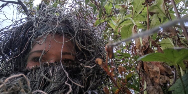 Woman Dresses Up As A Bush To Capture Sister's Wedding Proposal